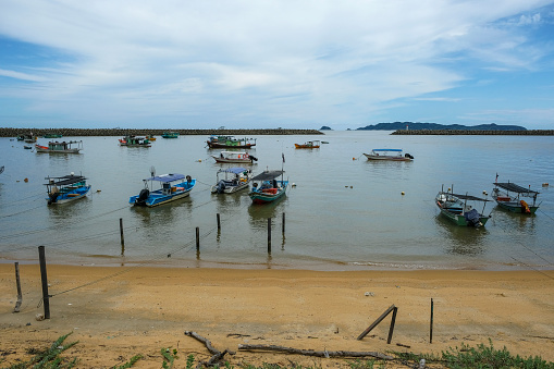 Marang, Malaysia - October 2022: Fishing boats on the Marang River on October 1, 2022 in Marang, Malaysia.