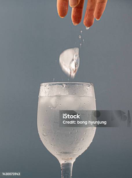 Glass Of Water With Ice Isolated Stock Photo - Download Image Now - Blue, Bubble, Clean