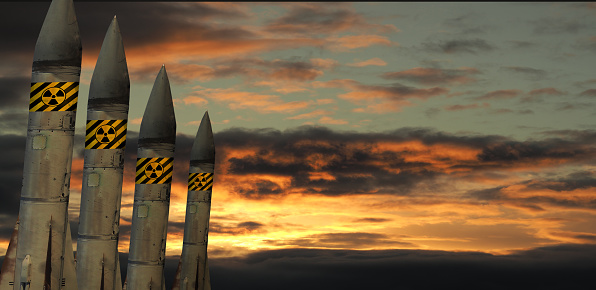 Nuclear missiles against the sky. The concept of the threat of nuclear war.