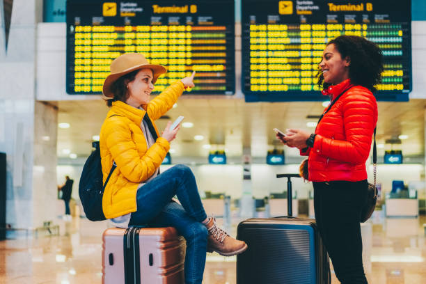 istock Friends at the airport 1430077659
