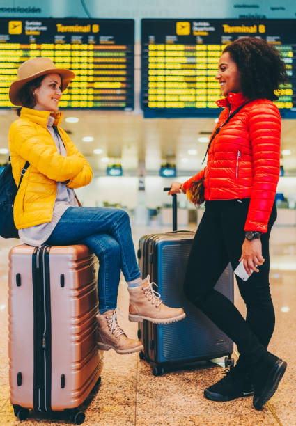 istock Friends at the airport 1430077933