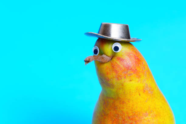 Close-up of a plump kiwi-bird like pear character with googly eyes wearing a cowboy hat pretending to be a detective.