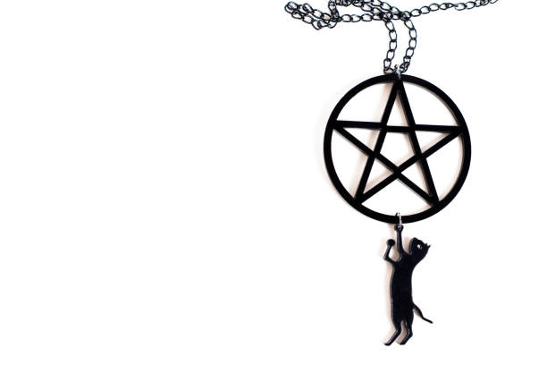 istock Pentagram necklace with black cat pendant on white 1430084983