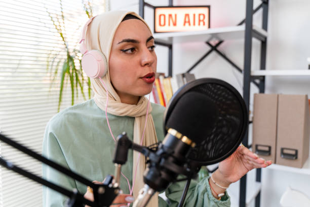 istock Muslim Female podcaster live streaming show 1430087379