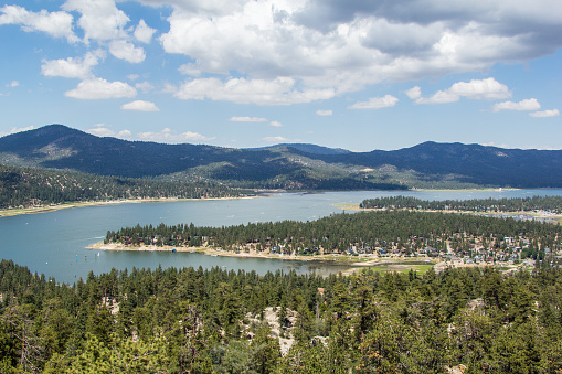 Aerial views of Big Bear, the mountains, the small town, and the large lake, taken by a drone.