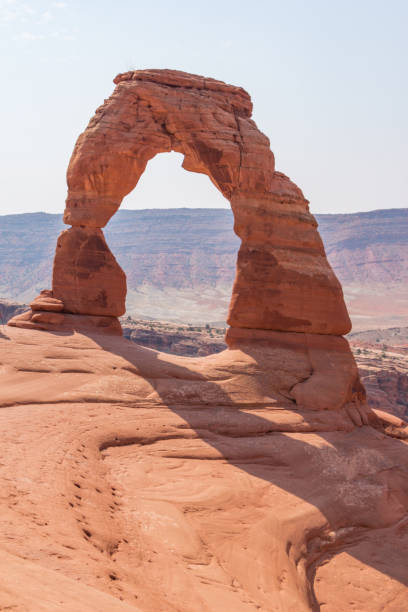 delicate arch - arch rock fotografías e imágenes de stock