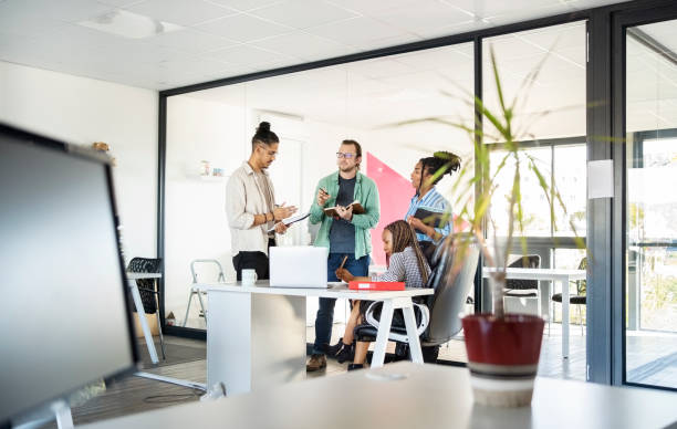 istock Business team working together on a project in office 1430091512