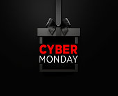 Cyber Monday Text Sitting Inside Of A Black Gift Box Tied With Black Ribbon On Black Background