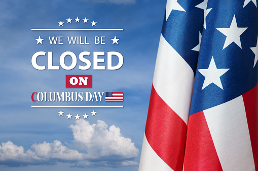 Columbus Day Background Design. American flag on background of blue sky with a message. We will be Closed on Columbus Day.