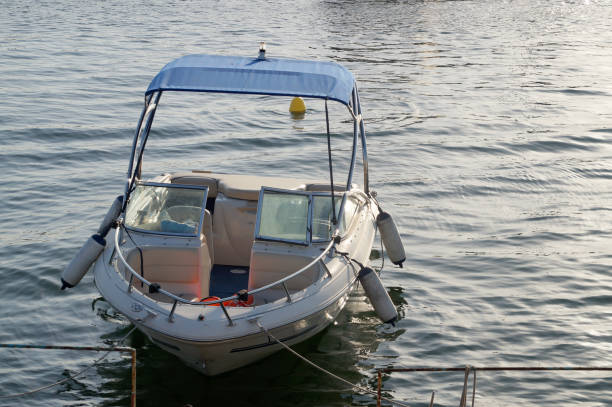 istock moored empty boat on the pier on the water 1430107008