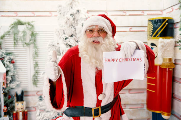istock Santa wishing a Happy Christmas 1430108154
