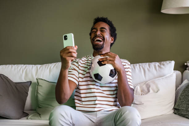 istock Winning an online bet on a soccer game 1430108318