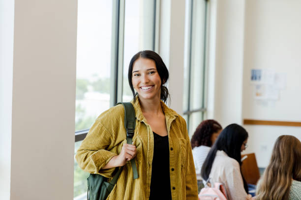 istock University student smiles for the camera 1430112819