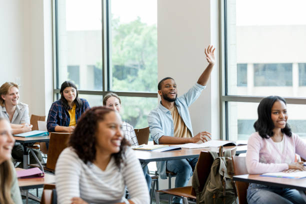 istock University students smile and listen to the presentation 1430112935