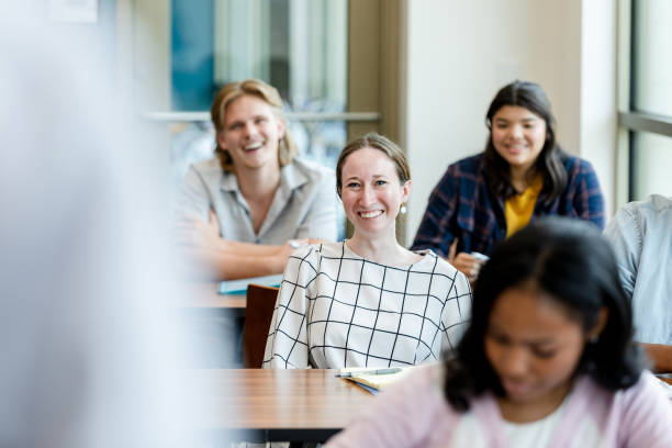 istock Diverse group of students listen to the presentation 1430112942