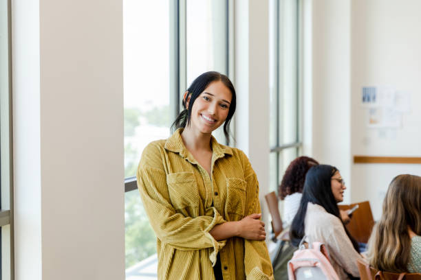istock Female university student smiles for the camera 1430114088