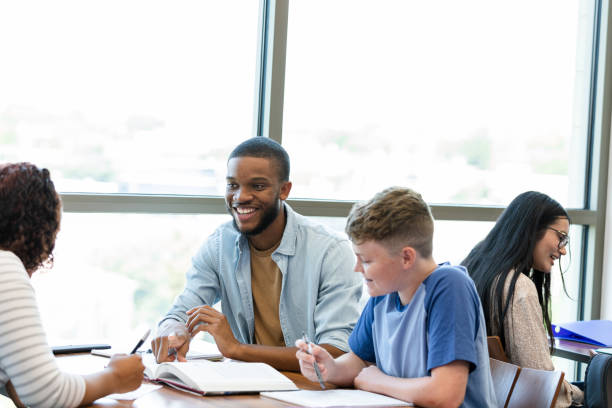 istock High school boy sits in his first university class 1430114120