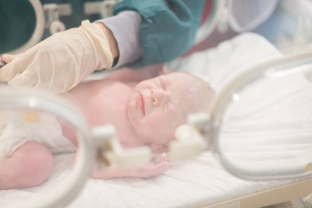 istock Crying Newborn Baby Cleaning After Birth 1430120689