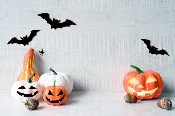 istock Halloween decorations on pastel gray background. Halloween concept. Pumpkin, bat and spider 1430121116