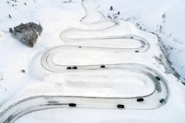 Aerial view of curvy winding road in Julier Pass, Swiss Alps, Graubunden Canton (Canton of Grisons).