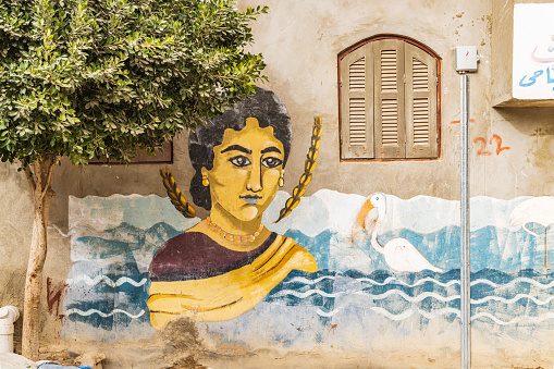 Faiyum, Egypt. February 19, 2022. Building decorated with murals in the village of Faiyum.