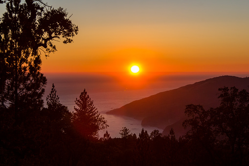 Sunset over the pacific at Big Sur. Camping on a mountain ridge.