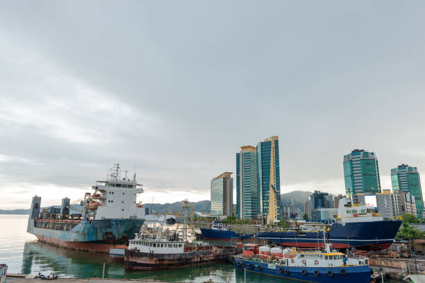Wharf ship Port of Spain Trinidad waterfront skyscraper city sea stock photo