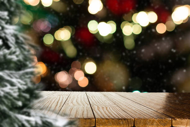 istock Blurred Christmas background with empty wooden table in focus. Empty display for product assembly 1430129967