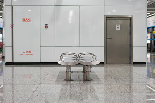 Metal seats in subway station