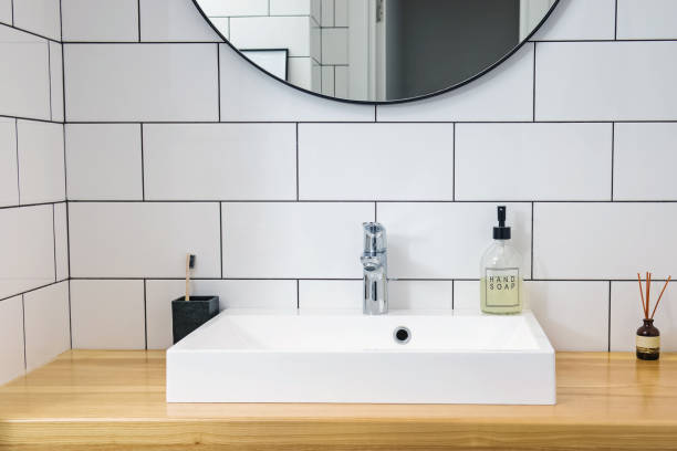 istock Minimalist bathroom interior, modern faucet and sink 1430131938