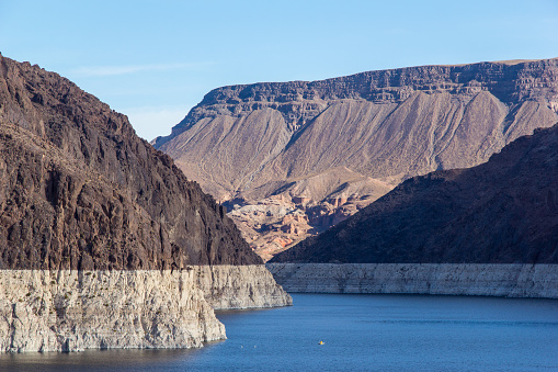 Drought in nevada and California becomes apparent with the lowering water line at the Hoover Dam.