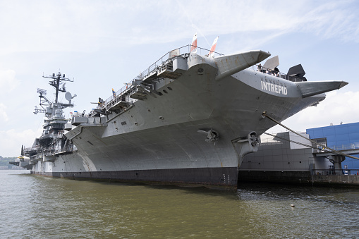 New York, NY, USA - June 3, 2022: The USS Intrepid, an aircraft carrier which is now a museum ship and part of the Intrepid Sea, Air and Space Museum.