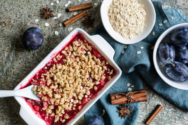istock Plum crumble pie with oatmeal in a pan 1430140910