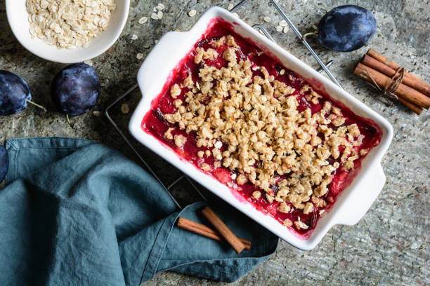 istock Plum crumble pie with oatmeal in a pan 1430140916