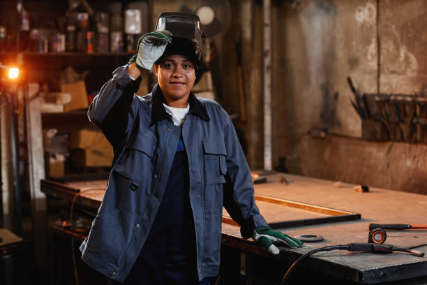 istock Smiling Female Welder In Workshop 1430147123