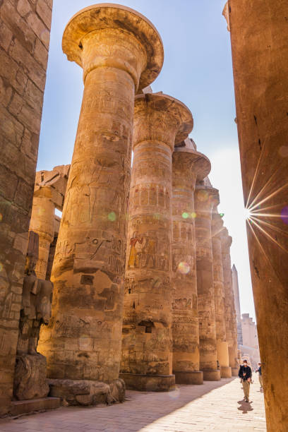 Columns of the Great Hypostyle Hall at the Karnak Temple complex in Luxor. Karnak, Luxor, Egypt. Columns of the Great Hypostyle Hall at the Karnak Temple complex in Luxor. temple of luxor hypostyle hall stock pictures, royalty-free photos & images
