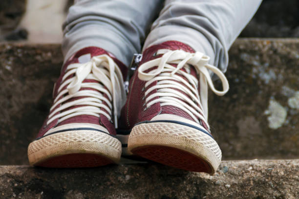 istock Dirty burgundy sneakers 1430152123