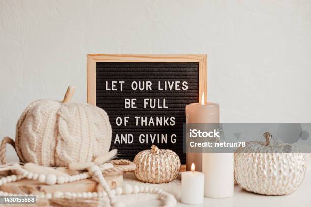 Felt Letter Board And Text Let Our Lives Be Full Of Thanks And Giving Autumn Table Decoration Interior Decor For Thanksgiving And Fall Holidays With Handmade Pumpkins And Candles Stock Photo - Download Image Now