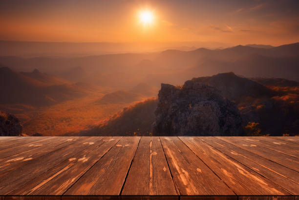 istock Beautiful Idyllic autumn landscape with empty wooden table 1430156130