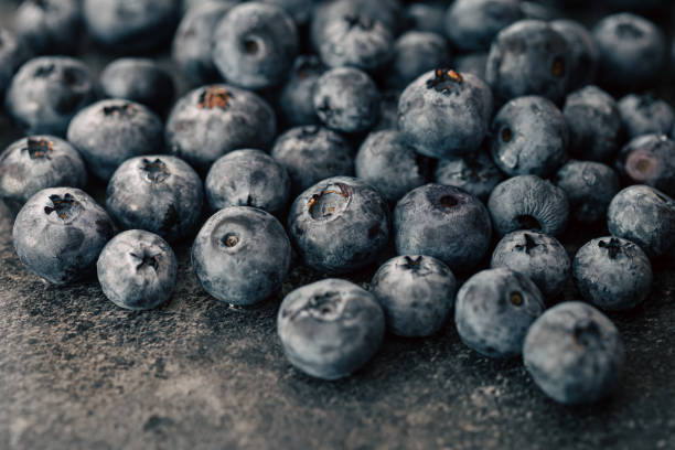 istock Wet ripe blueberries close up, macro shot. 1430161695