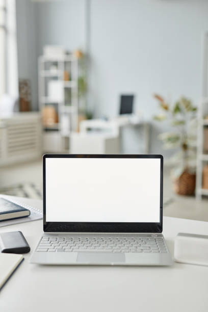 istock Laptop Mock Up On Desk Vertical 1430161944