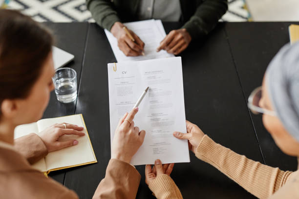 istock Hr Manager Reading Cv in Job interview 1430161976