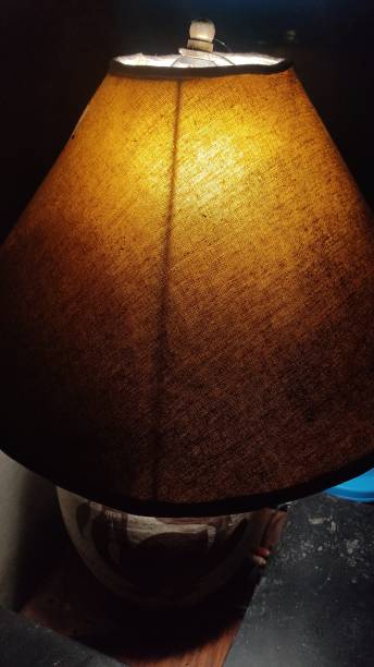 istock A lamp that gives off a dim yellow light. 1430171625