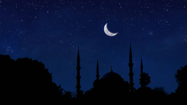 istock silhouette islamic mosque with background of blurred starry sky night and crescent moon 1430188209