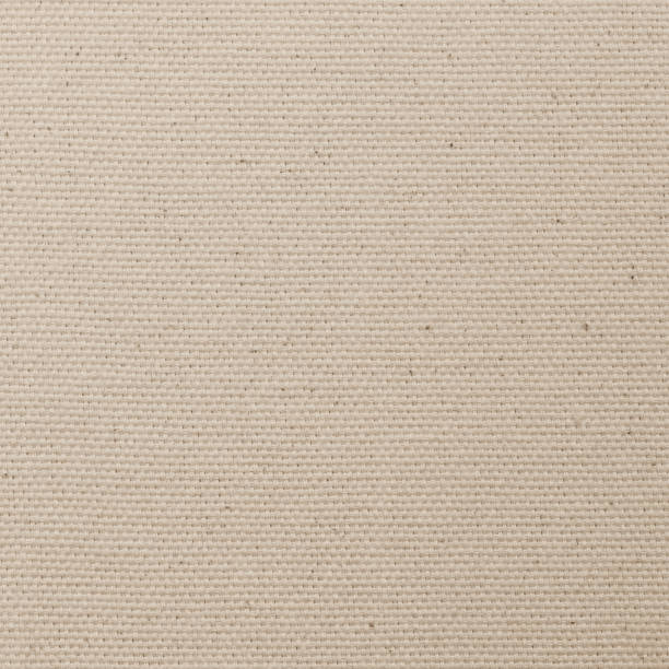 istock Muslin woven texture background light cream beige brown color 1430193721