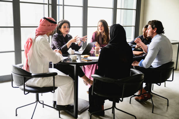 istock Diverse Riyadh business people discussing project plans 1430206665