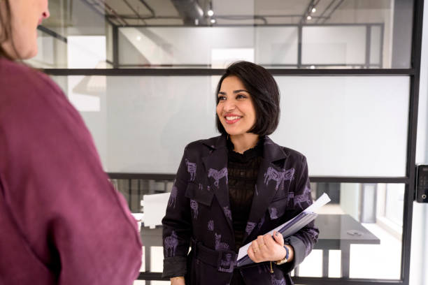 istock Cheerful Middle Eastern businesswomen in modern office 1430206696