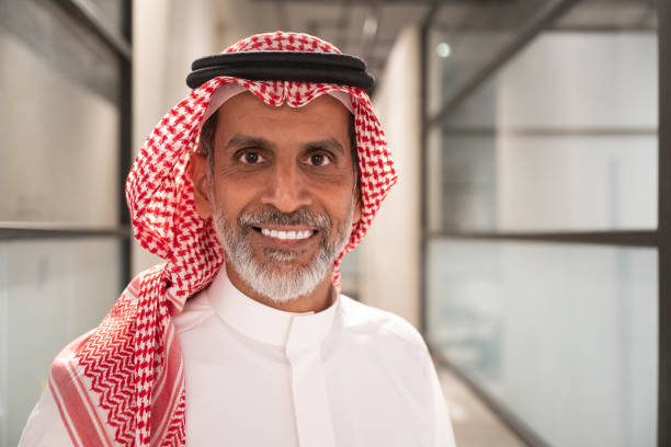 istock Headshot of bearded Riyadh executive in modern office 1430206712