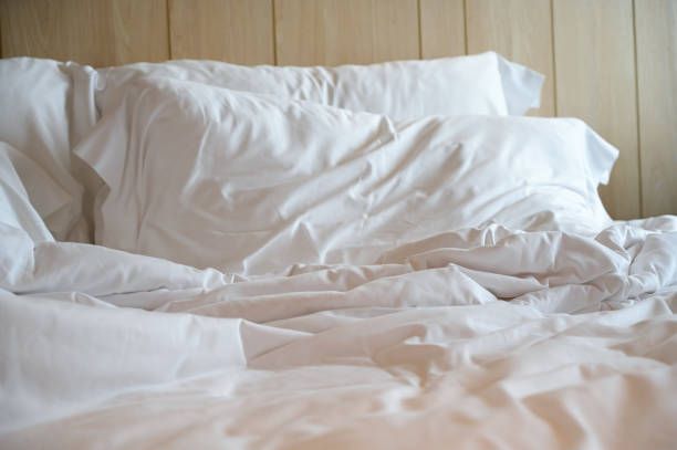 istock white bed and pillows in the room 1430214881