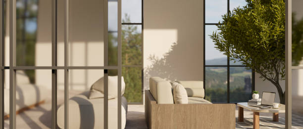 istock Comfortable hotel lounge seating and relaxing area near the window interior design 1430220040